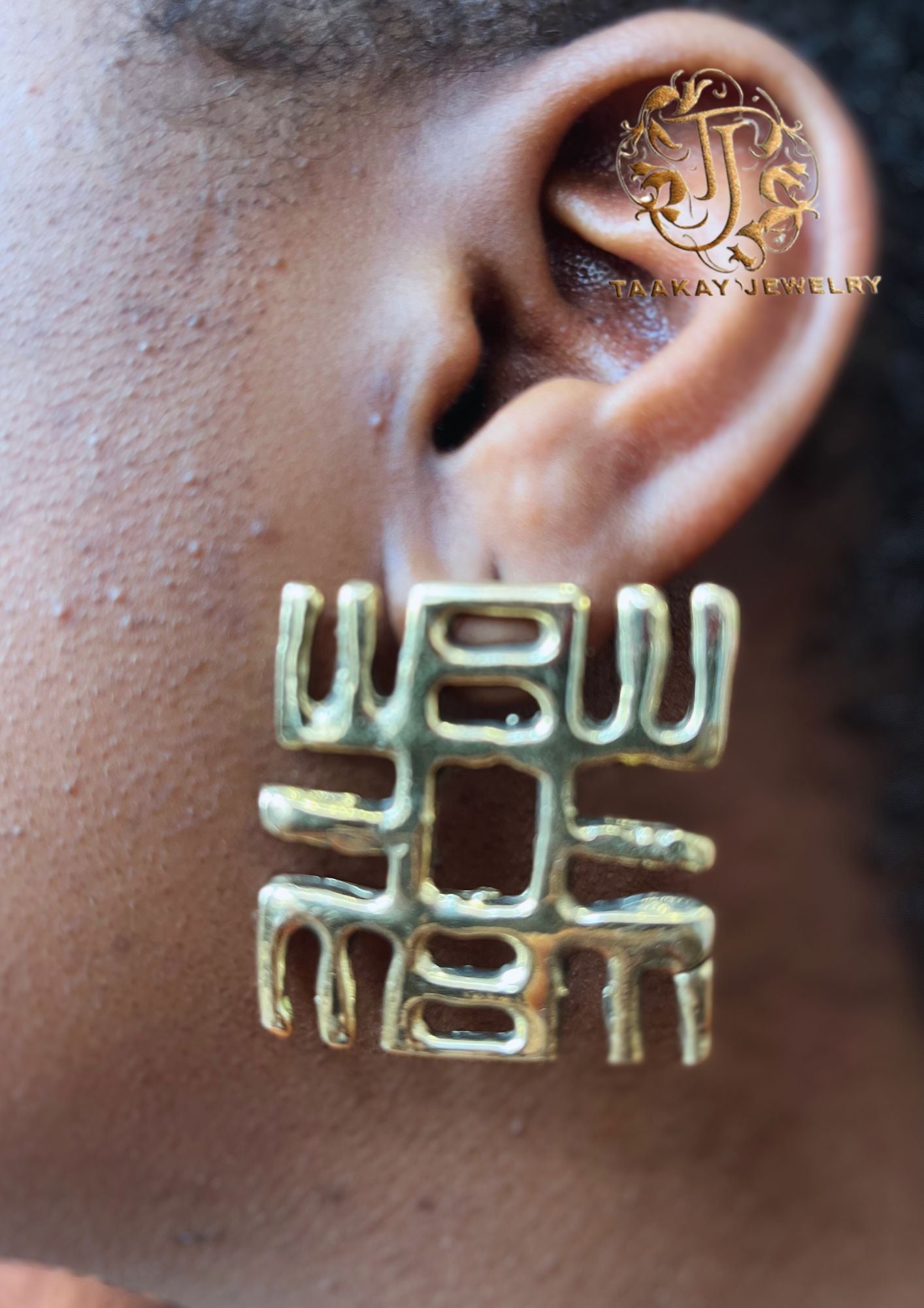 Boucles d'oreilles en bronze "Nea onnim no sua a ohu"